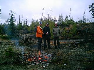 Warming up by the fire in June, Brad, Paul, Rob