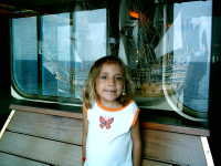 Liz by a model ship