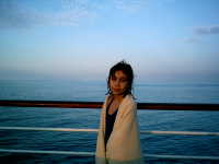 Vick posing by the sea