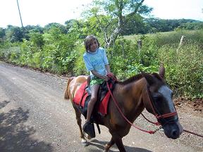 Liz riding a horse