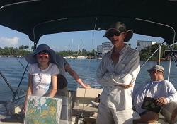 Lizzy driving the boat