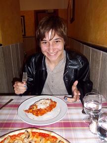 Vicki eating lasagna