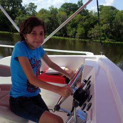 Liz driving the big boat